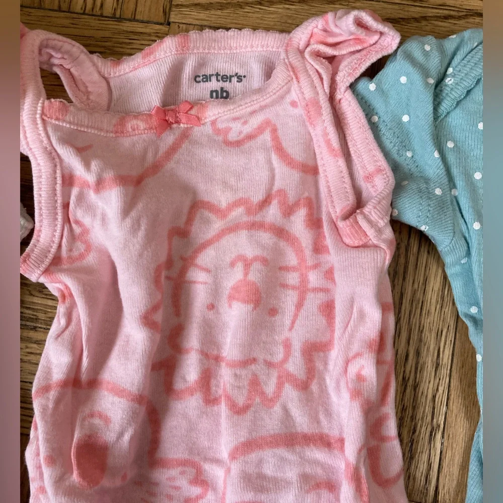 Carter’s Newborn Onesies